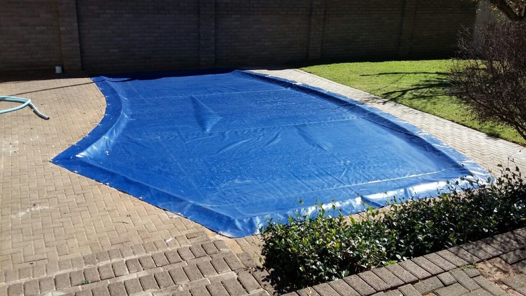 Laying the Pool Cover